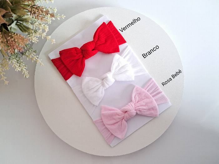 Laço em rosa bebé e vermelho