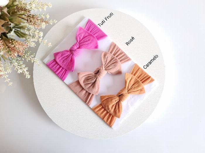 Laços em caramelo, rosé e tutti frutti para bebés e pequenas